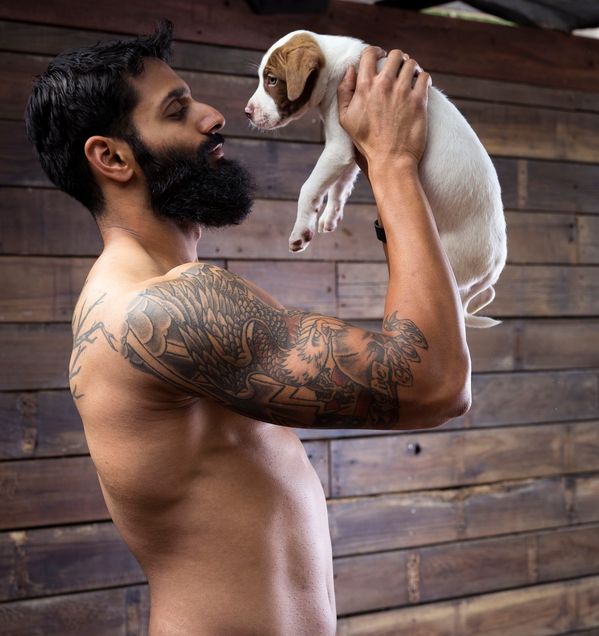 Kutyákkal pózoltak amerikai testépítők